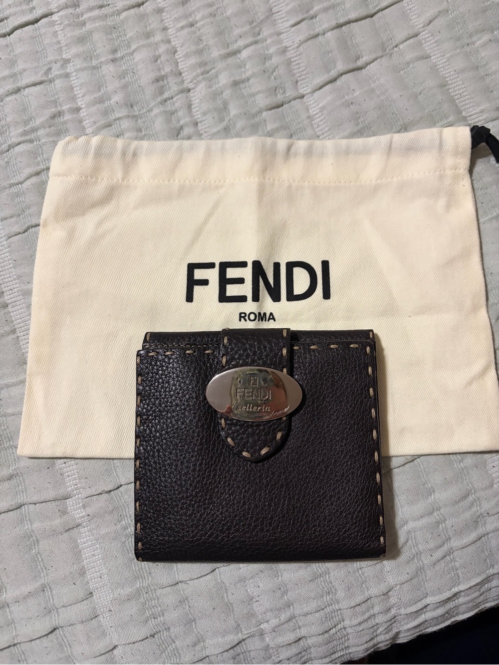 Fendi Brown Leather Selleria wallet with silver Logo Plate.  Dust bag included